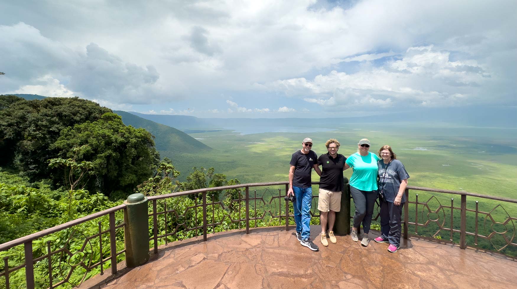 Michael Laubscher and his guests posing on a lookout point at the Ngorongoro Crater in Tanzania.