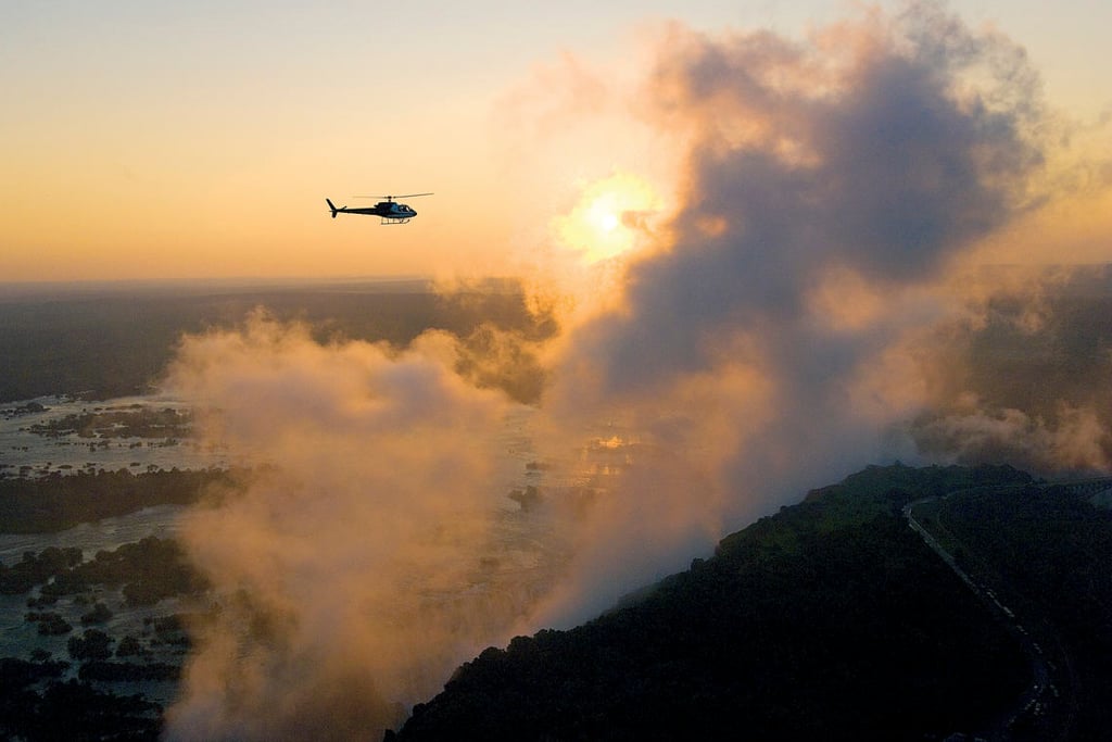 Helicopter over vic falls - discover zimbabwe adventure and action