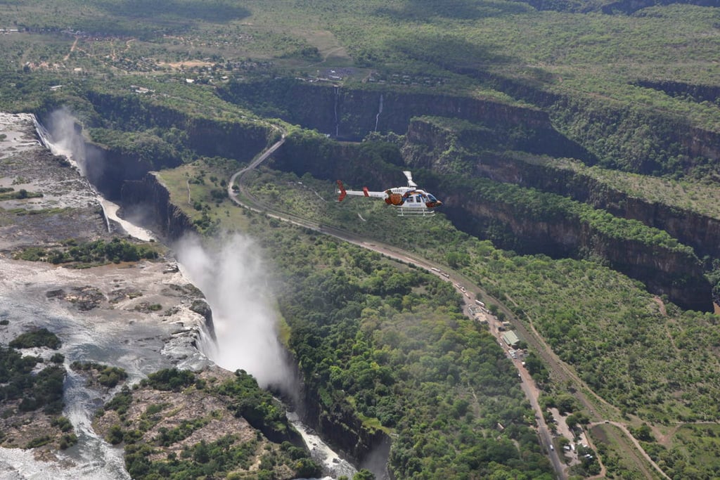Helicopter over vic falls - discover zimbabwe adventure and action