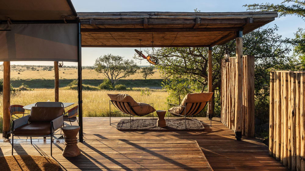 an image of the guest room at the mara river tented camo in tanzania