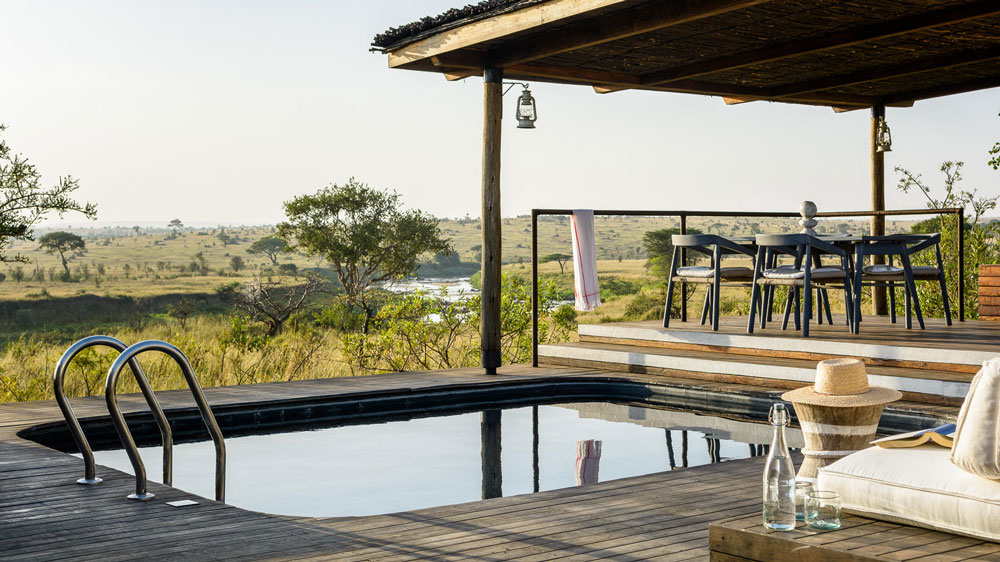 an image of the guest swimming pool at the mara river tented camp in tanzania